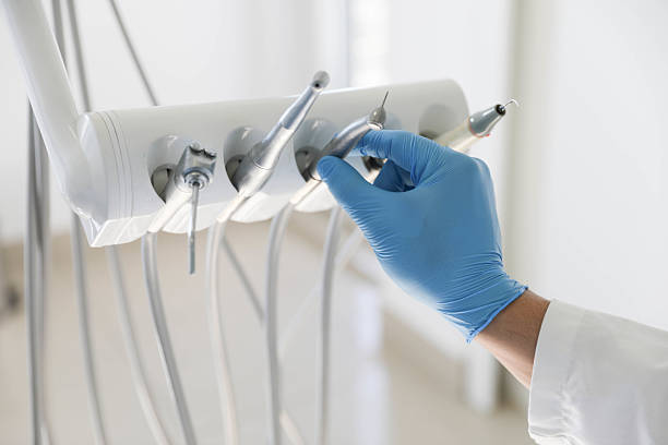 Professional Tooth Extraction technician working in Meadow Lakes, AK